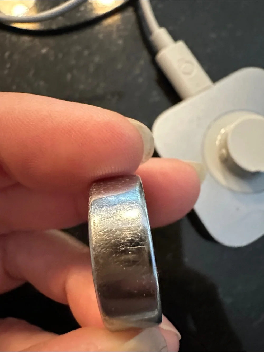 Oura Silver Charging Dock with silver ring